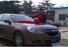 超前涂料獎勵員工轎車，真石漆生產(chǎn)廠家！